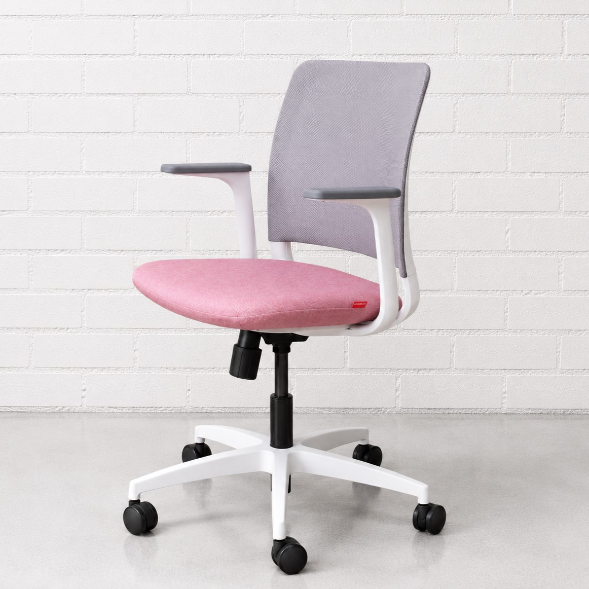 Studio Modern Yutu Low Back Fully Adjustable Chair with White Frame and 5-Star Wheelbase Grey Mesh Back and Azalea Pink Seat